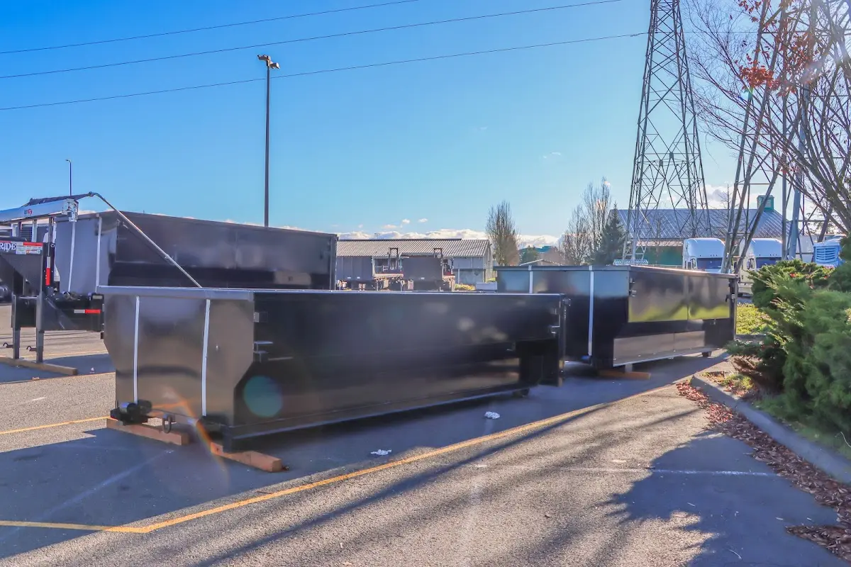 Roll-off dumpster ready for waste disposal at job site for 12 Yard Dumpster Rental in King